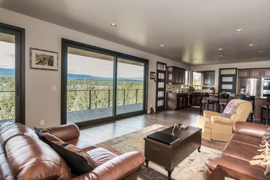 Large elegant formal and open concept dark wood floor and brown floor living room photo in Other with brown walls, no fireplace and no tv