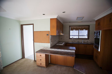 Photo of a contemporary home design in Sydney.