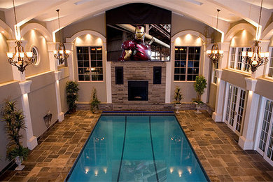 Expansive traditional indoor rectangular lap pool in Toronto.