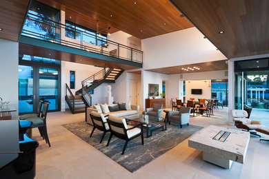 Trendy open concept living room photo in Santa Barbara with white walls