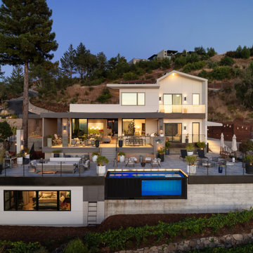 A little farm below a hillside resort-style off-the-grid view home