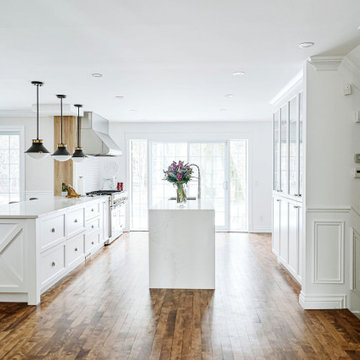 U shaped kitchen with hardwood floors