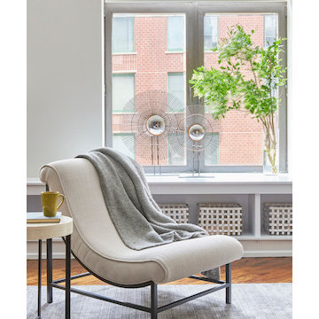 A custom-made slipper chair that is both modern and comfortable