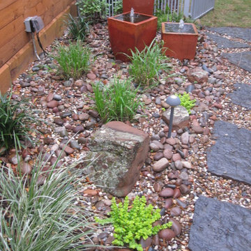 A wrap around garden with a fabulous water featurel!