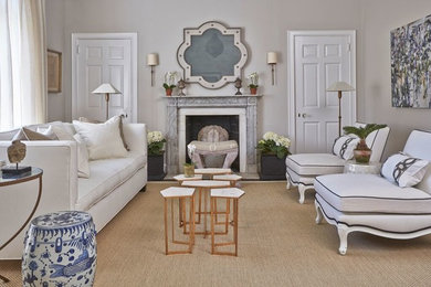 Example of a mid-sized transitional enclosed and formal dark wood floor living room design in New York with beige walls, a standard fireplace, a stone fireplace and no tv