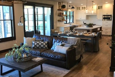 Country living room photo in Other