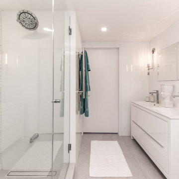 Downtown Miami White Bathroom Remodel for a Bayfront Condo