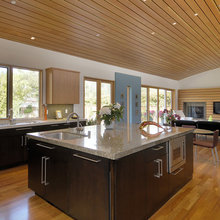 Open room concept with wood ceiling