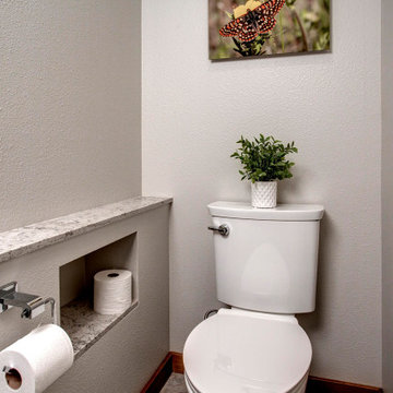Serene Bath for TwoThis image showcases a neat and functional powder room