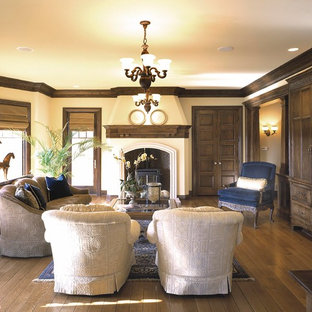 This is an example of a mediterranean living room in Omaha with a wood burning stove.