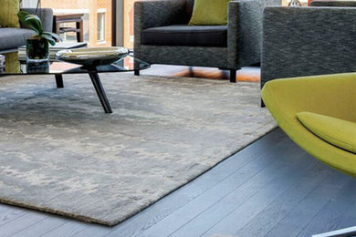 Inspiration for a large modern formal and enclosed medium tone wood floor living room remodel in Columbus with multicolored walls