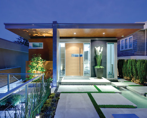 Modern Entry Inspiration for a modern entryway remodel in Vancouver with a pivot front door and a medium