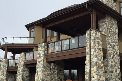 Example of a transitional patio design in Calgary