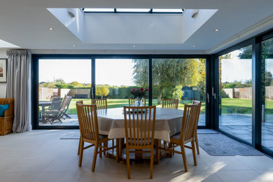 Design ideas for a contemporary dining room in Hertfordshire.