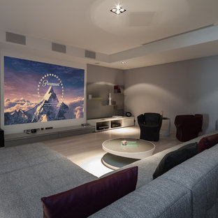 Home theater - contemporary home theater idea in Nice