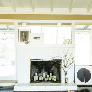 Fireplace with Leaning Art + Candles