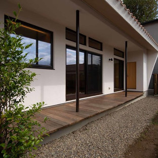 他の地域のサンタフェスタイルのおしゃれなデッキの写真