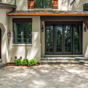 Rear Covered Entry with French Doors off the Breakfast Room and Brussels Block
