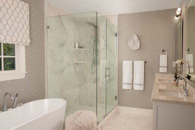 Mid-sized transitional master bathroom in Louisville with furniture-like cabinets, white cabinets, a freestanding tub, a corner shower, a two-piece toilet, white tile, porcelain tile, grey walls, porcelain floors, an undermount sink, engineered quartz benchtops, white floor, a hinged shower door and white benchtops.