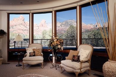 Family room - traditional carpeted and beige floor family room idea in Philadelphia with beige walls