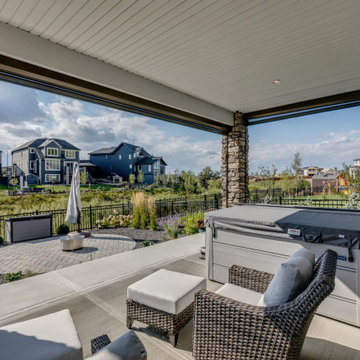 Enclosed StruXure Pergola and Lower Walkout with Phantom Motorized Screens