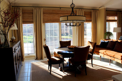 Example of a mid-sized transitional ceramic tile great room design in New York with beige walls and no fireplace