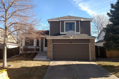 Elegant gray two-story wood house exterior photo in Denver