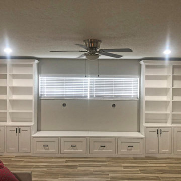 Custom Built-In Cabinets and Window Seat shown in Bright White on Maple