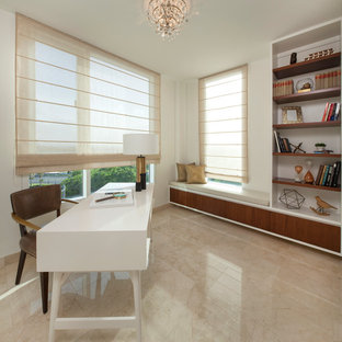 Photo of a medium sized modern study in Other with beige walls, marble flooring, a freestanding desk and no fireplace.