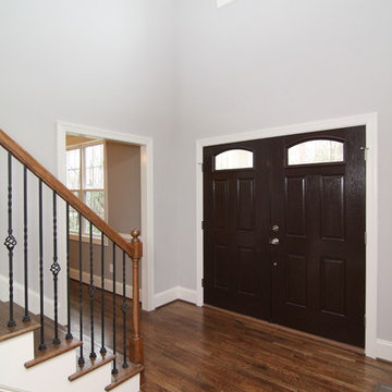 Two story foyer with dual front doors