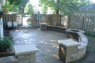 Photo of a large full sun backyard landscaping in Cleveland.