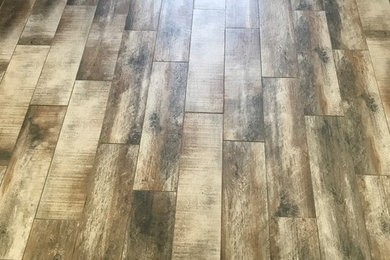 Inspiration for a ceramic tile foyer remodel in Other