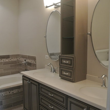 Custom his and hers vanity with a tower in a custom paint color.