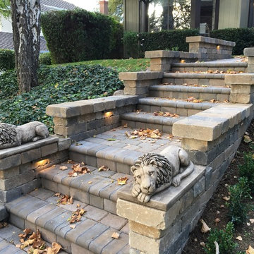 Calstone Antiqued Cobble Paver with Bullnose and Roman Stone Front Steps