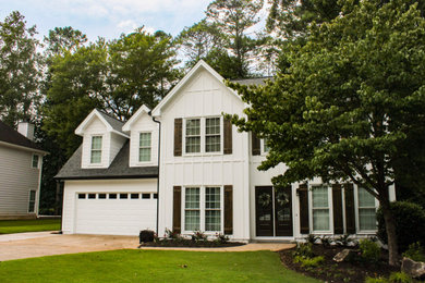 Inspiration for a white board and batten house exterior remodel in Atlanta