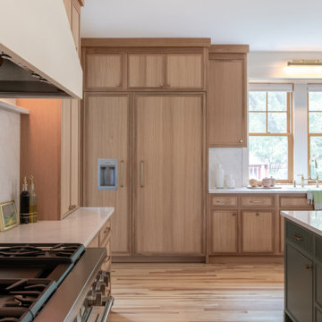 Warm Modern Kitchen Renovation with Natural Oak & Green Accents