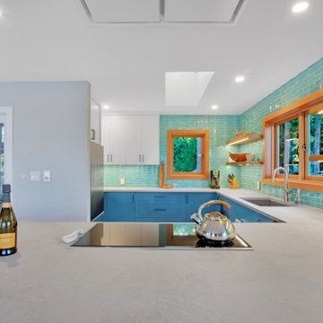 Custom Blue Kitchen with Aqua Tile & Oak Floating Shelves