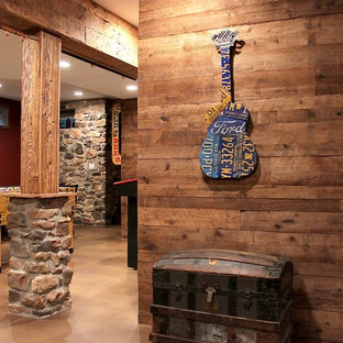 Design ideas for a medium sized rustic fully buried basement in Philadelphia with brown walls, concrete flooring and beige floors.
