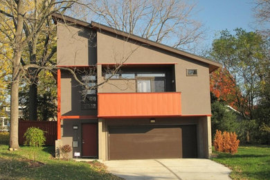 Example of a minimalist gray exterior home design in Kansas City