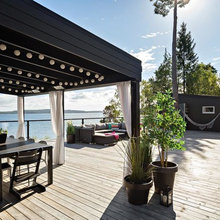 Houzz Tour: Semesterkänsla året om i huset vid havet på Tyresö