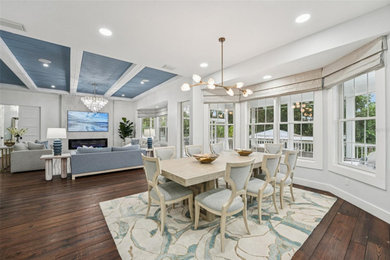 Inspiration for a large coastal dark wood floor dining room remodel in Tampa
