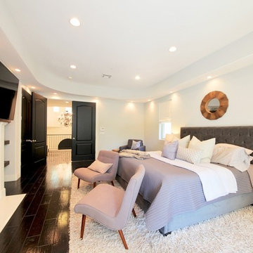 Gray Tufted Bed, Slipper Chairs, Shag Rug in Master Bedroom