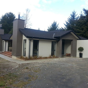 Modern Home built in place of tired house, what a transformation