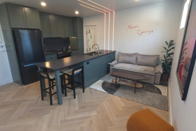 Transitional living room photo in Denver
