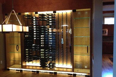 Wine cellar - modern wine cellar idea in Denver