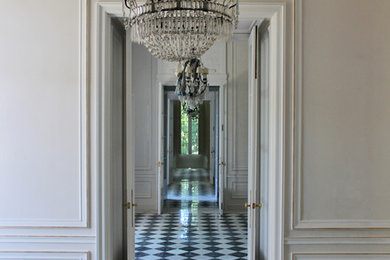 Example of a large classic hallway design in Barcelona with white walls