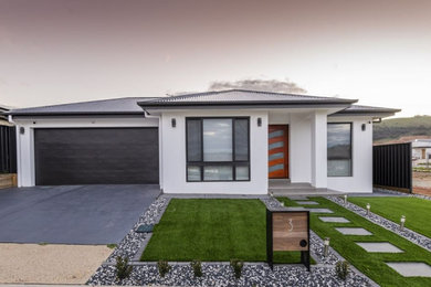 Inspiration for a modern one-storey exterior in Canberra - Queanbeyan.