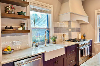Photo of a large traditional kitchen in Providence with a belfast sink, shaker cabinets, purple cabinets, multi-coloured splashback, porcelain splashback, stainless steel appliances, medium hardwood flooring, an island, yellow floors and multicoloured worktops.