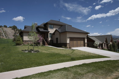 Photo of a traditional home design in Denver.