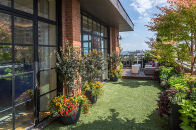 This is an example of a transitional patio in Newark.